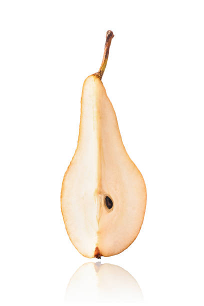 Half of Williams or Bartlett pear, slice, isolated on white background