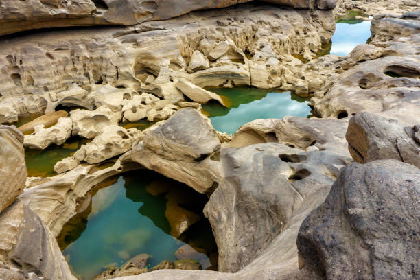 istock Natural sandstone group Eroded through time for thousands of years. Ubon Ratchathani, Thailand. 695310364
