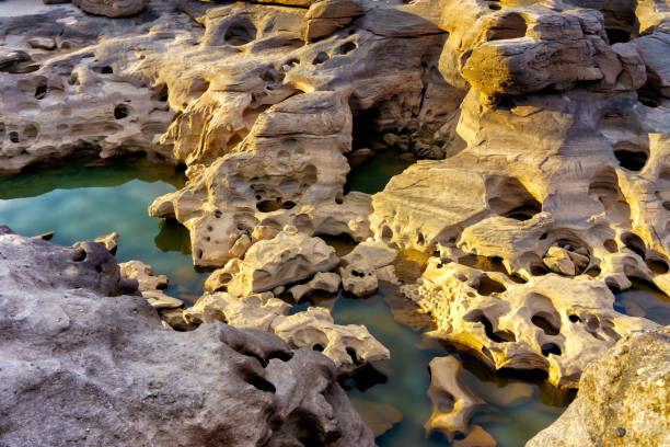 istock Natural sandstone group Eroded through time for thousands of years. Ubon Ratchathani, Thailand. 695310374