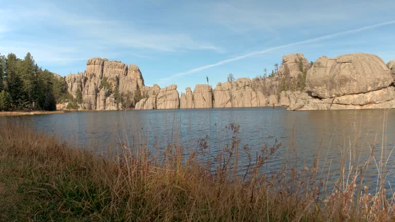 Jagged rock formations rising from Sylvan Lake in Black Hills, Custer State Park