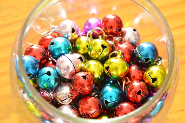 istock colorful bells in glass bottle 695310758