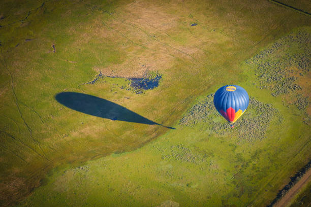 Flying above the ground in hot air balloon
