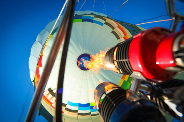 istock Hot air balloon filling up 695313206