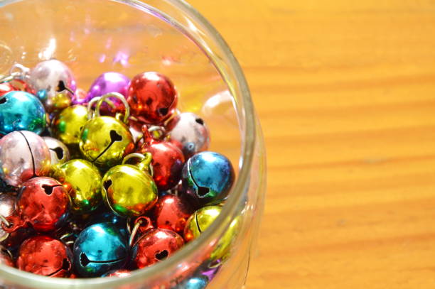 istock colorful bells in glass bottle 695313268
