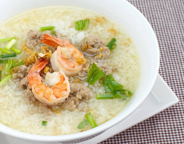 istock Rice soup bowl with shrimp and pork 695325072