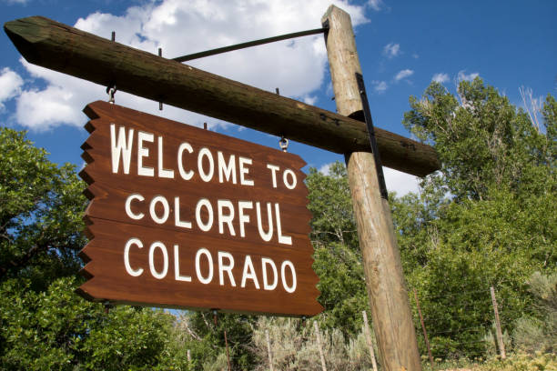 istock Tilted Welcome to Colorful Colorado sign 695328786