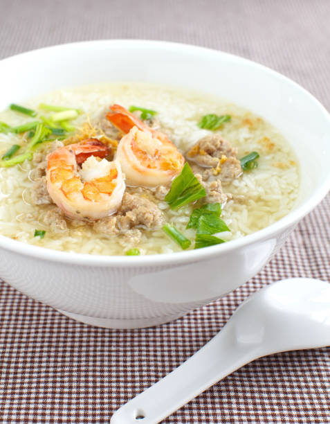 istock Rice soup bowl with shrimp and pork 695331544
