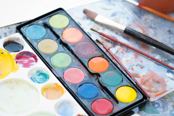 istock paint set and palette with brush for child. 695338096