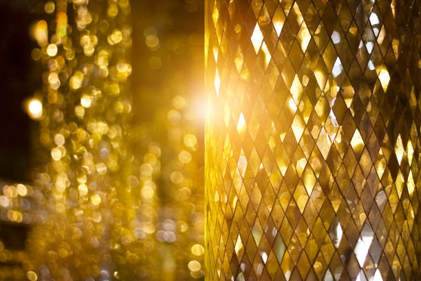Shining golden mosaic glass background