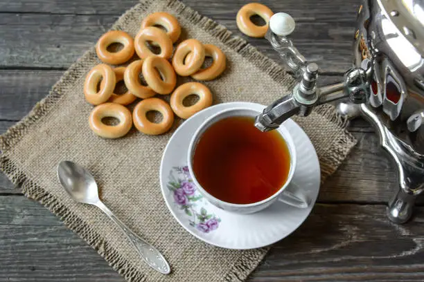 Hot aromatic tea from a samovar with bagels