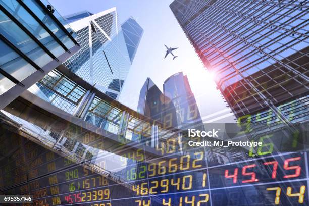 Stock Market Exchange On A Skyscraper In Hong Kong Background Stock Photo - Download Image Now