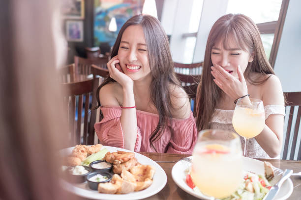 istock women dine in restaurant 695358854