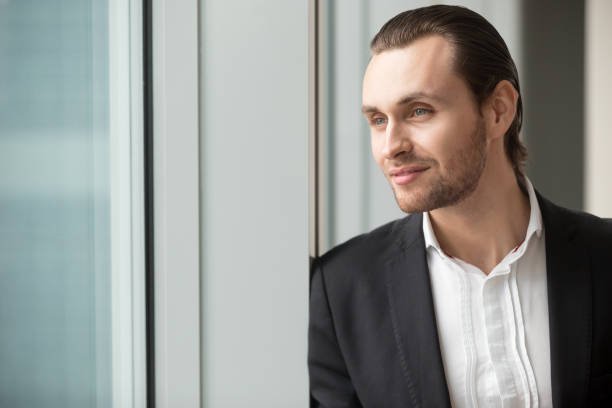 istock Successful businessman imagines great career 695358908