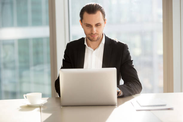 istock Businessman surfing information in Internet 695359836