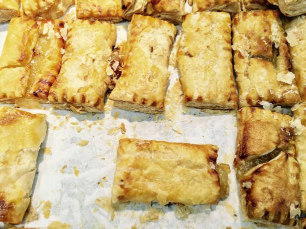 istock Puff Pie Stuffed with Sour and Sweet Pineapple 695361982