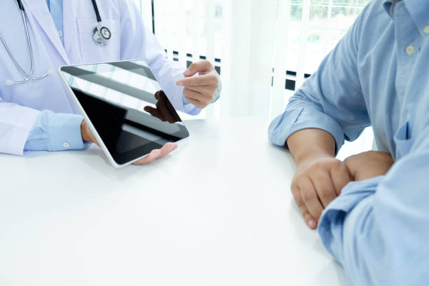 istock Doctor and patient. 695364922