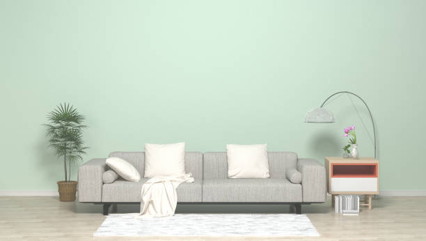 istock blue wall with sofa & sideboard Cabinet on wood floor,art works 3D Rendering 695365238