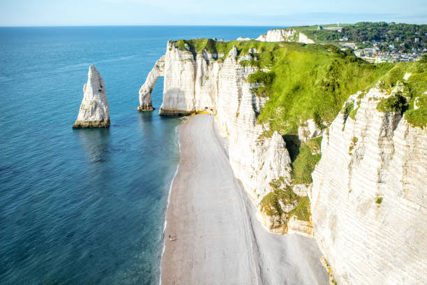 istock Landscape view on the rocky coastline in Etretat 695368452