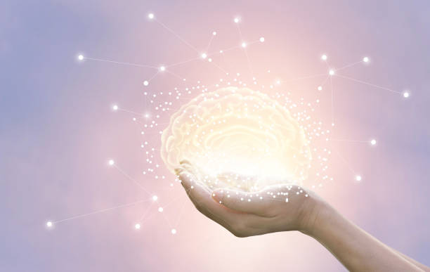 istock Palm hold and protect virtual brain on pastel background, innovative technology in science and medical concept 695372170