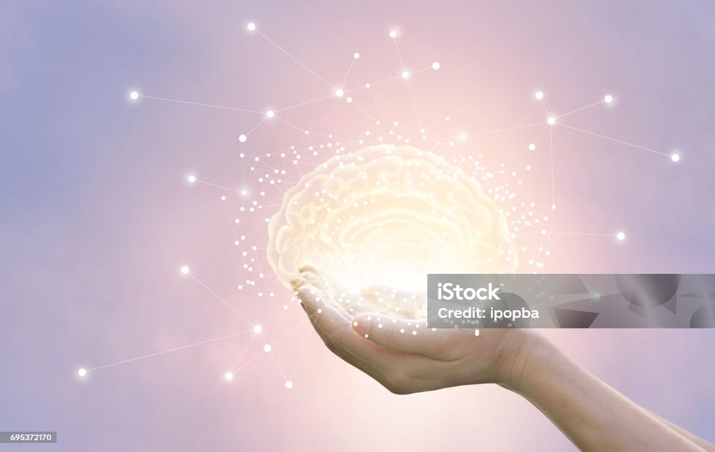 Palm hold and protect virtual brain on pastel background, innovative technology in science and medical concept Human Brain Stock Photo