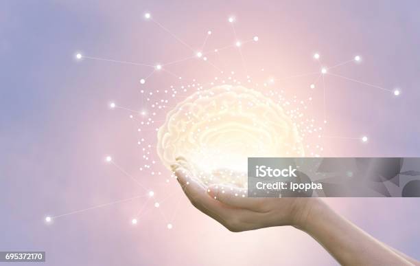 Palm Hold And Protect Virtual Brain On Pastel Background Innovative Technology In Science And Medical Concept Stock Photo - Download Image Now