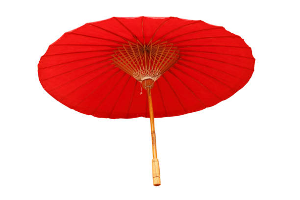 istock Beautiful red umbrella isolated on white background. 695390448