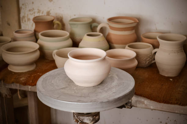 istock many clay pot is on the table 695392798