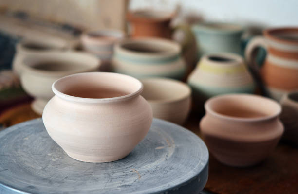 istock many clay pot is on the table 695392912