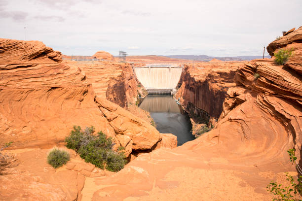 Distant view of Glen Canyon Dam. Scenic view of rock formation. Idyllic shot of Glen Canyon.
