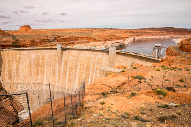 Scenic view of Glen Canyon Dam by Colorado River Glen Canyon Dam by Colorado River. Scenic view of semi-arid landscape. Idyllic view of natural landmark. glen canyon dam stock pictures, royalty-free photos & images