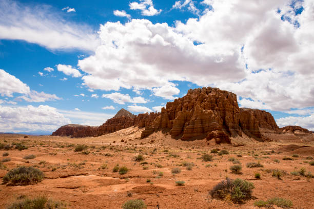 istock Rocky mountains in desert against sky 695394818