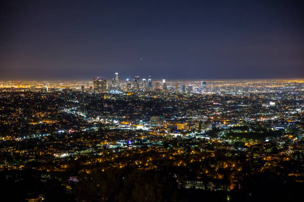 istock Aerial view of illuminated cityscape at night 695397228