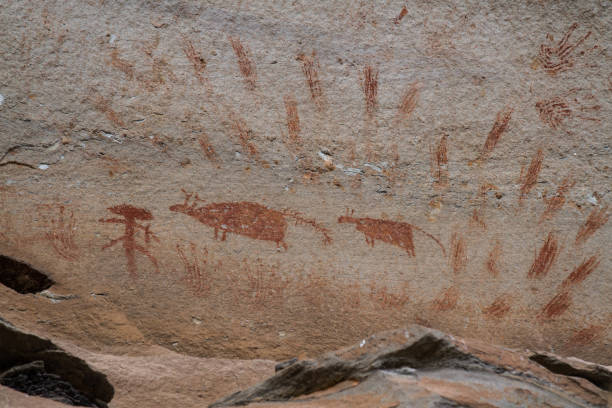 istock Prehistoric rock painting 695397330
