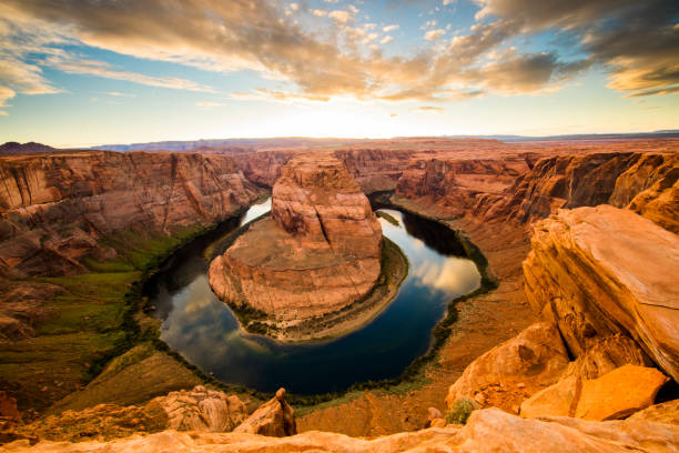 istock Scenic view of Horseshoe bend against sky 695397360