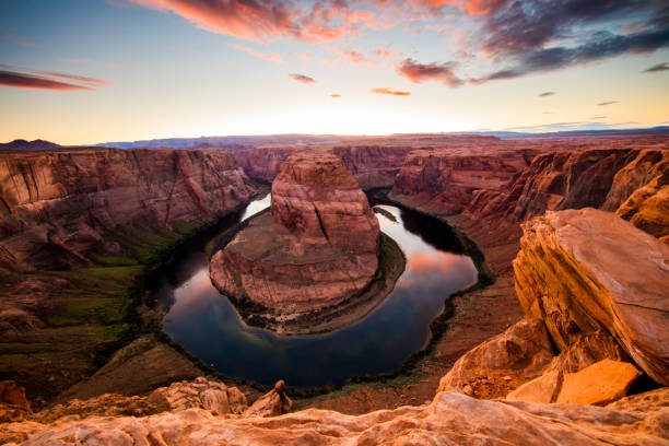 istock Idyllic view of Horseshoe bend against sky 695397416