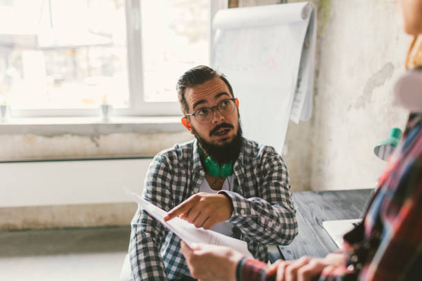 istock Coworkers collaborating in the office 695407746