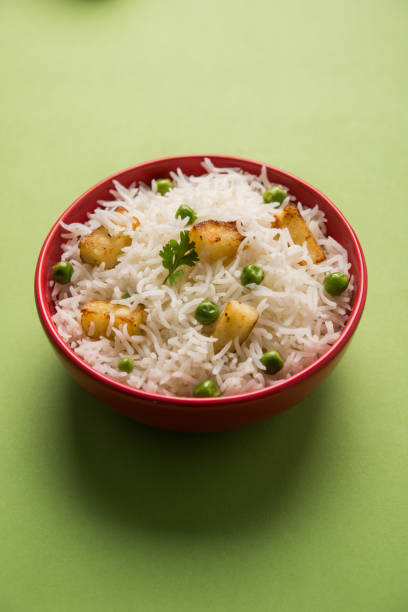 istock authentic paneer or soya bean or green peas pulav or vegetables rice or veg biryani with paneer cubes and soya chunk, selective focus 695408236