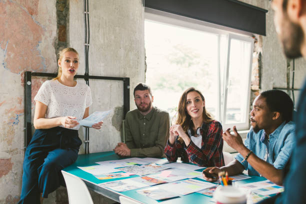 istock Coworkers collaborating in the office 695411184