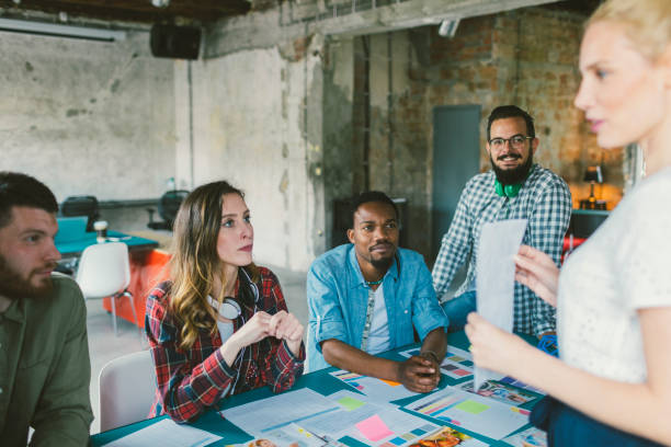 istock Coworkers collaborating in the office 695411502