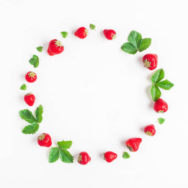 istock Creative round frame made of strawberry. Flat lay, top view 695412036