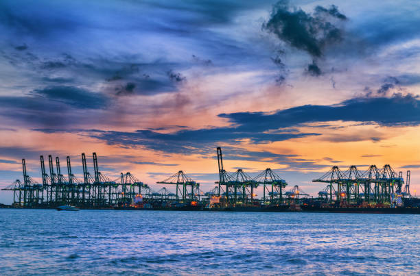 istock Terminal of cargo shipping at twilight. 695416122