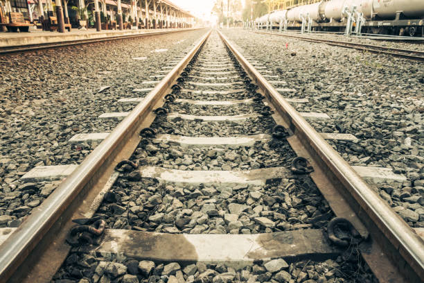 istock Old railroad tracks at train station 695416226