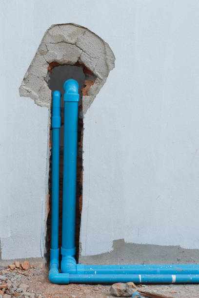 istock water pipe pvc plumbing under cement wall in construction site building 695418960