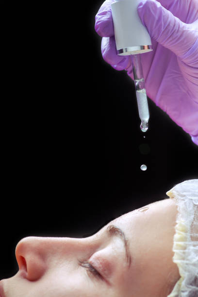 istock Beautiful woman face with moisturising drop 695425354