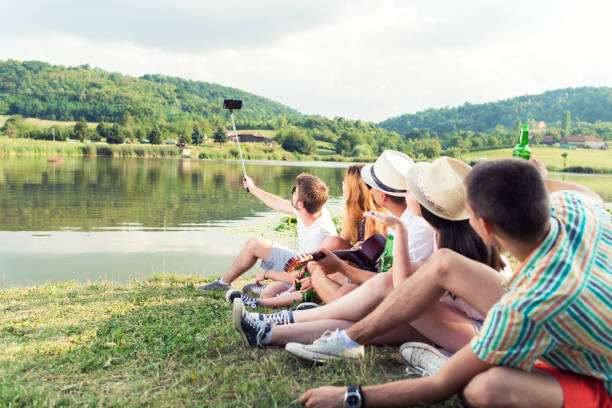 istock Hipster Friends Taking Selfie 695425800