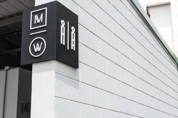 istock Modern toilet sign on concrete wall 695426324