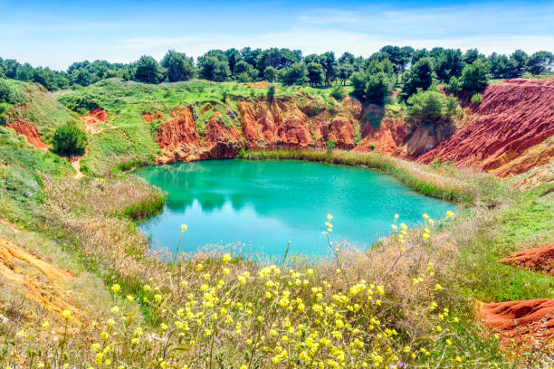 istock Bauxite Quarry Lake in Otranto, Italy 695437420