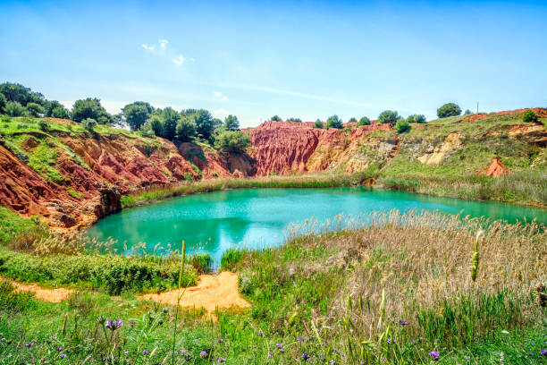 istock Bauxite Quarry Lake in Otranto, Italy 695437472
