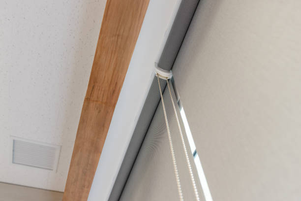 istock close up part of roller blind 695438172