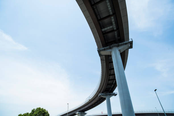 istock Concrete pillar and highway and blue sky. 695450870